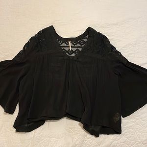 Free people. Small black flowy top.